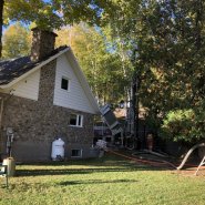 Puits artésien Charlevoix - Baie-St-Paul - Collerette de bentonite - foreuse sur chenilles- comacchio mc-900P - pompe submersible - forage samson - forage charlevoix - puits charlevoix